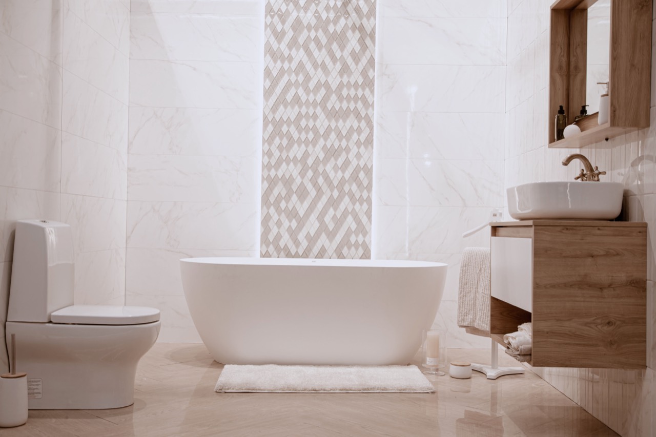 Sparkling clean modern bathroom with freestanding tub